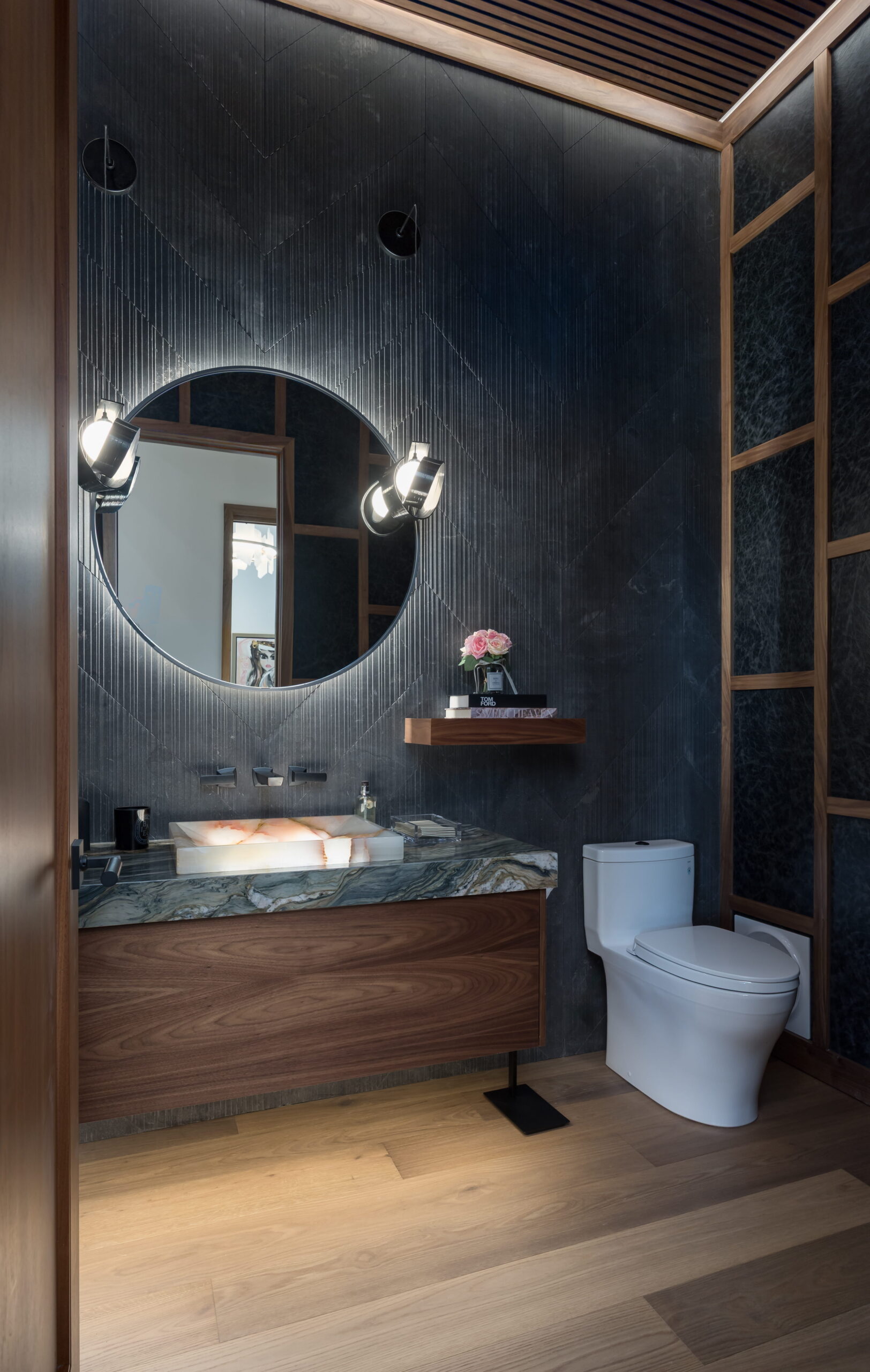 Panel of smoked oak hardwood flooring highlighting wood species characteristics and texture for style and durability considerations.