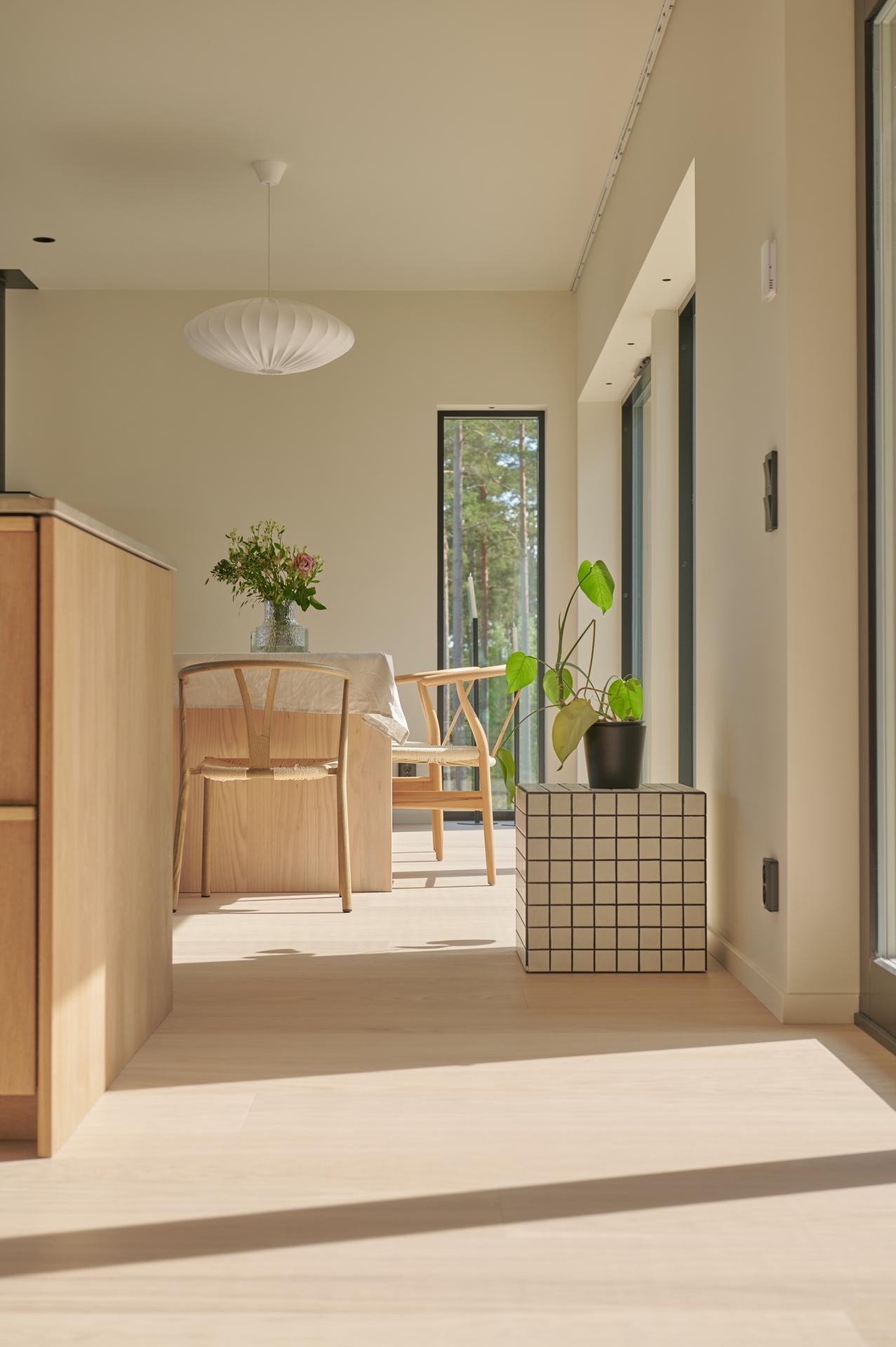 Water-resistant wood flooring surface showing liquid spill behavior and finish protection