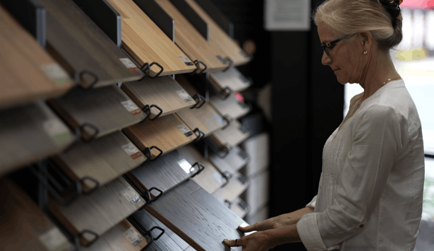 Customer comparing flooring samples